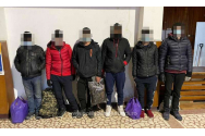 18 migranți ascunși în camioane cu marfă, prinși la Arad