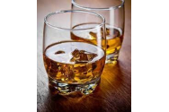  Hoţul care n-a furat nimic, demascat de amprentele de pe sticla de whisky