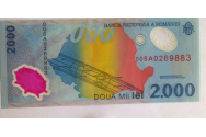 Bancnota de 2.000 de lei cu eclipsa de soare din 1999 valorează o avere. Poți câștiga chiar 40.000 de lei pe ea!