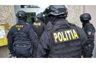 Percheziții la o grupare care a furat 70 de milioane de lei din conturile unei bănci