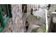 Femeie blocată într-un tub de beton, în propria casă