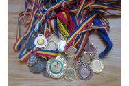 Tot mai mulți elevi ieșeni urcă pe podumurile olimpiadelor şi concursurilor naţionale