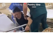 Infirmiera și brancardierul care au bruscat un bătrân la Spitalul Bârlad au fost dați afară