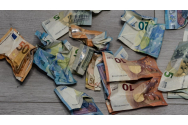 Moneda națională este supraevaluată, cursul real fiind de 5,22 lei / euro